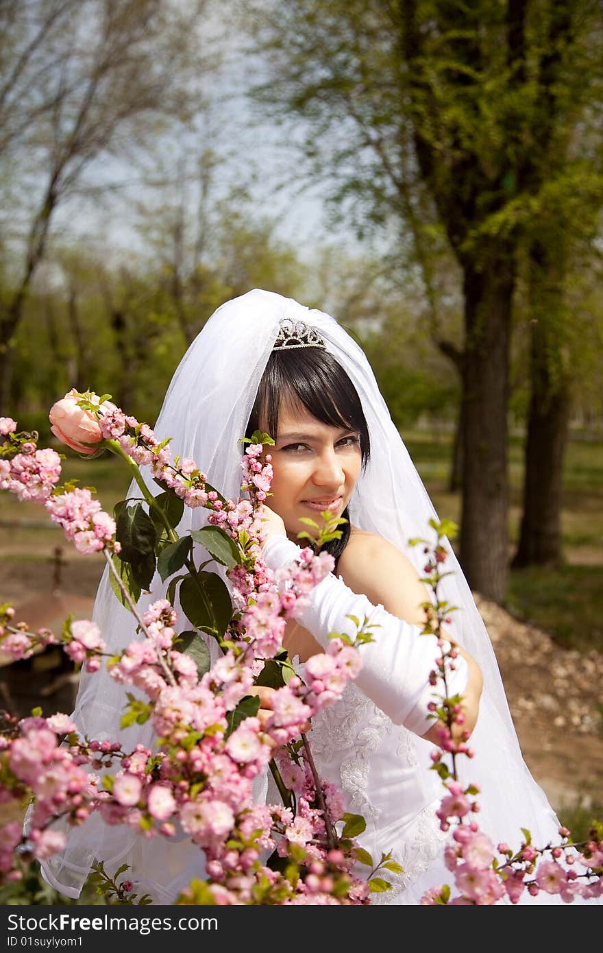 Pretty bride stand up and smile