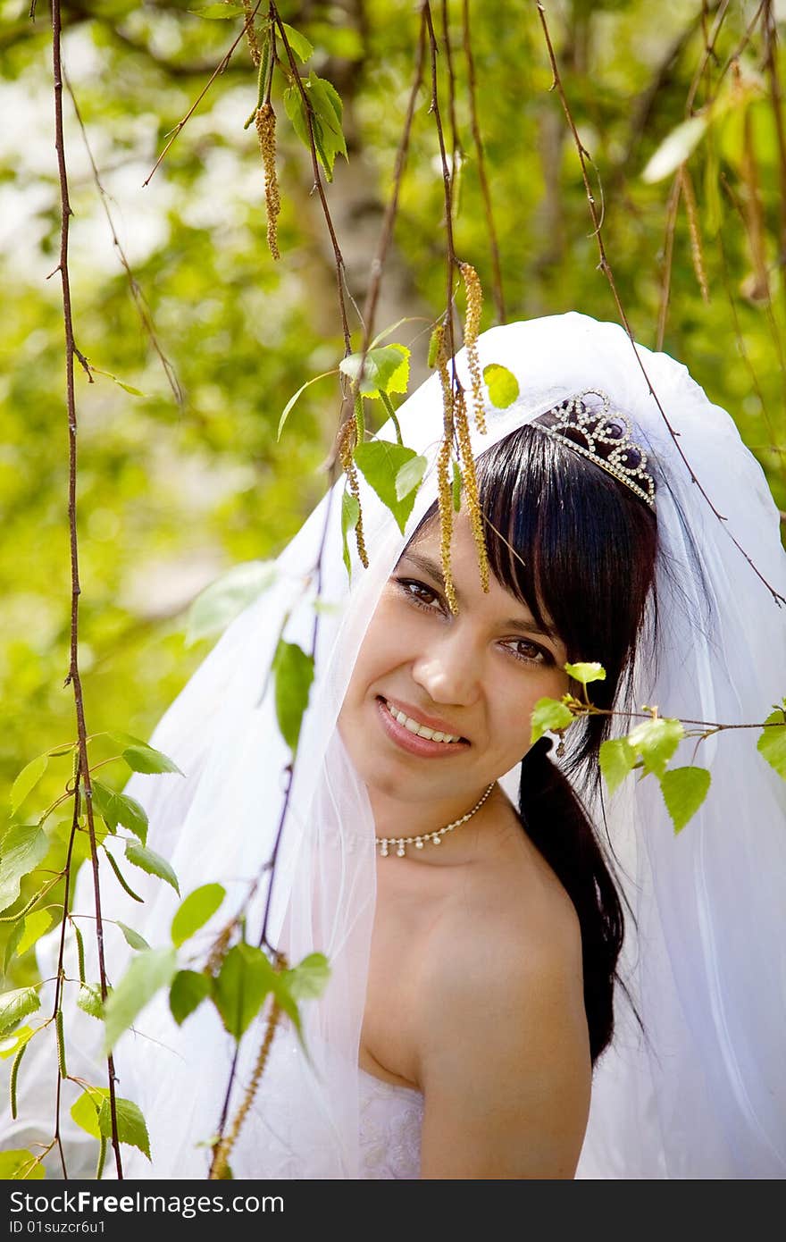 Pretty bride stand up and smile