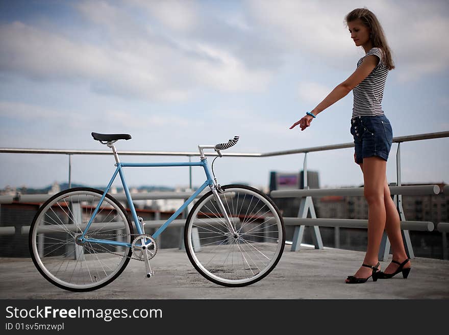 A girl and fixed gear bicycle. A girl and fixed gear bicycle