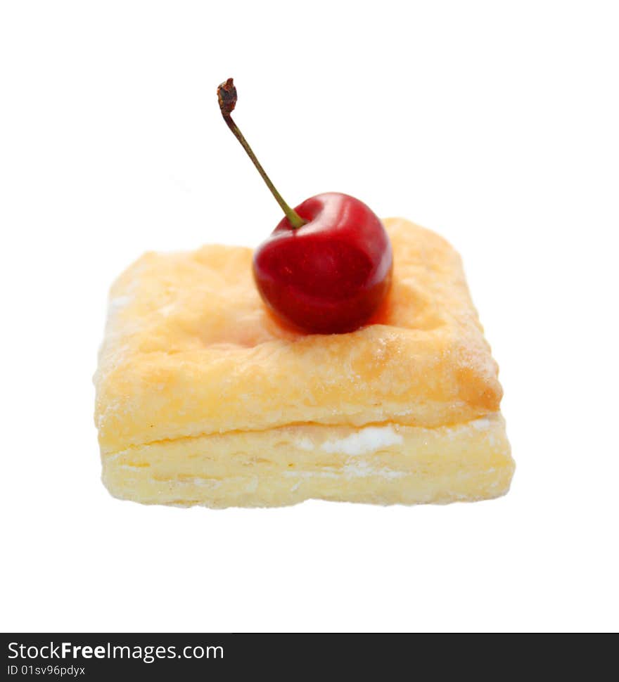 Isolated flaky cookie with cherry jam