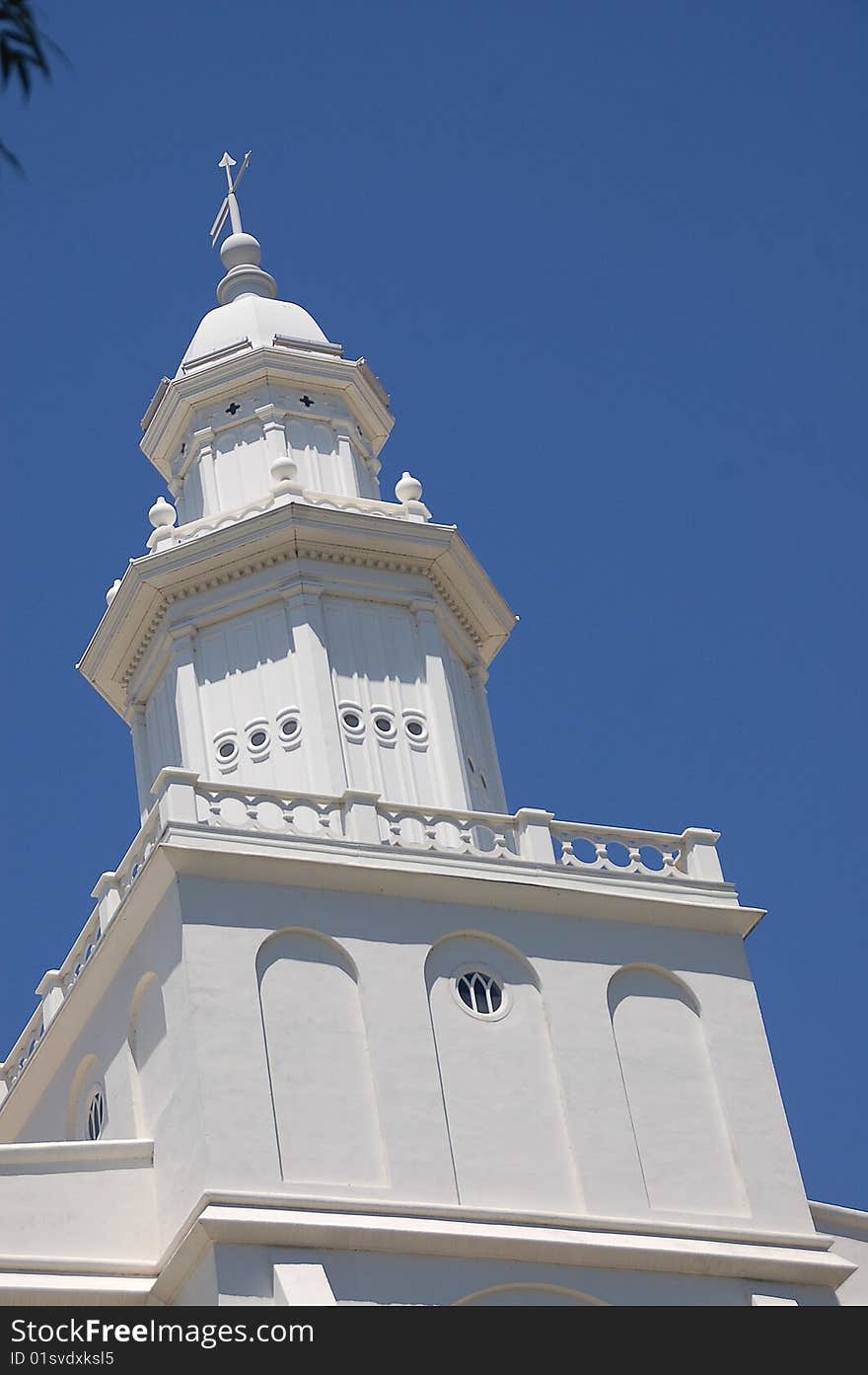 Temple steeple against the blue sky