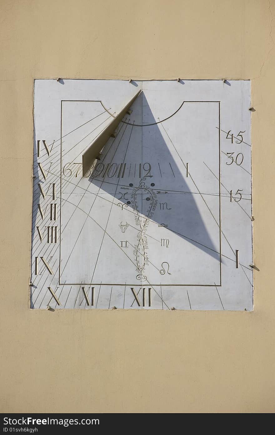 Sundial on a house wall