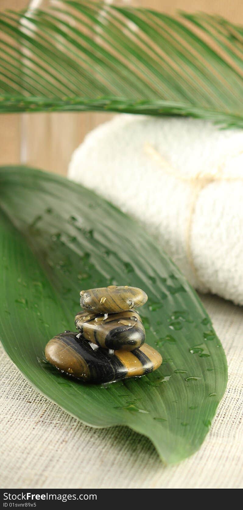 Zen stones presented on a banana leaf. Zen stones presented on a banana leaf