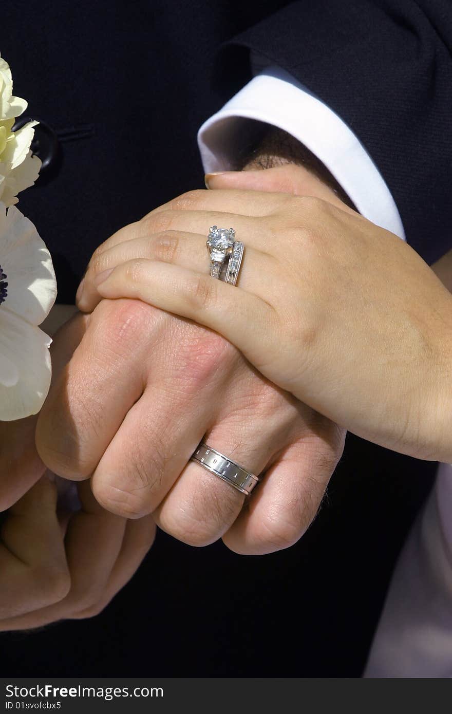 Newlywed hands shot at a wedding. Newlywed hands shot at a wedding