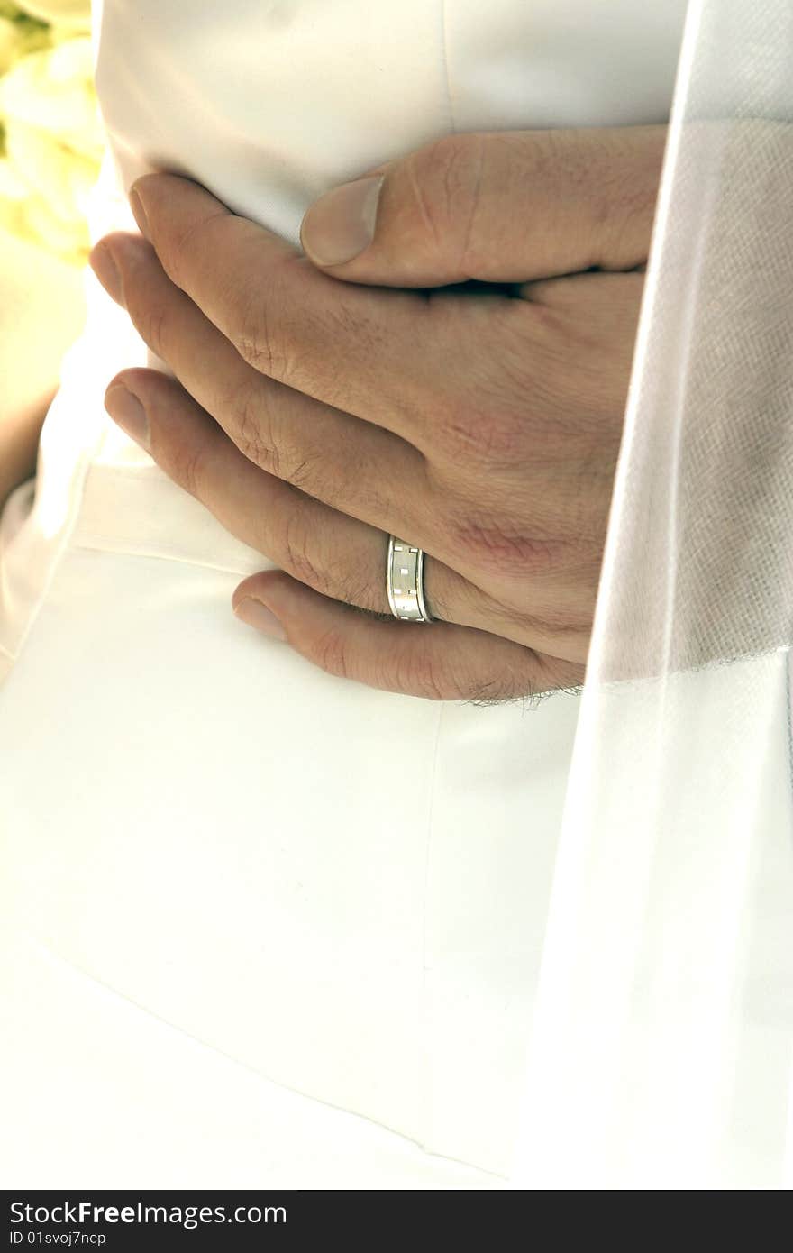 Newlywed hand shot at a wedding. Newlywed hand shot at a wedding