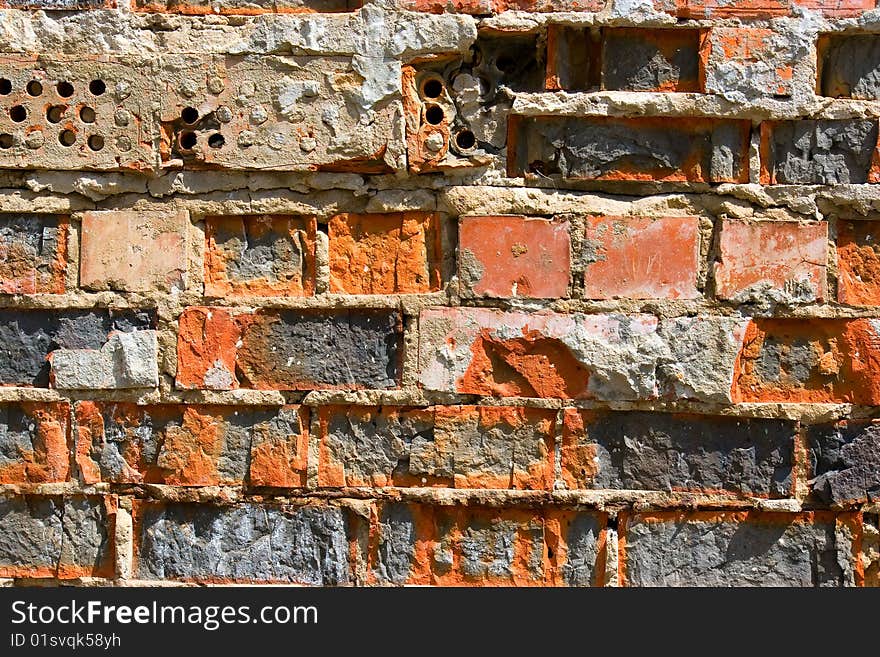 Old colored brick wall texture