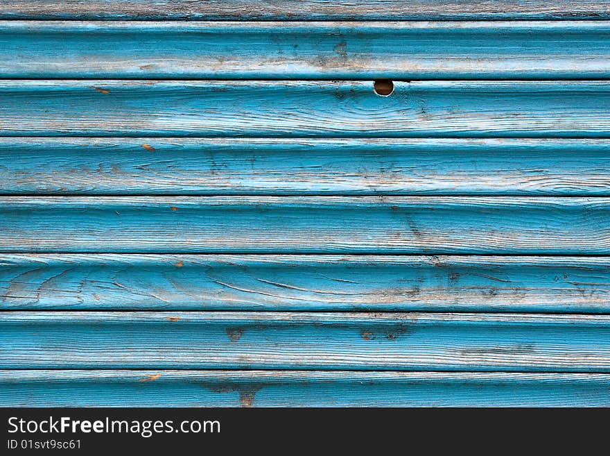 Dirty, stained by a paint the hammered together fence. Dirty, stained by a paint the hammered together fence