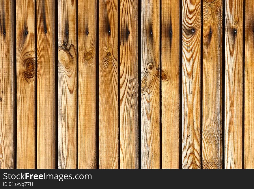 Dirty, stained by a paint the hammered together fence. Dirty, stained by a paint the hammered together fence