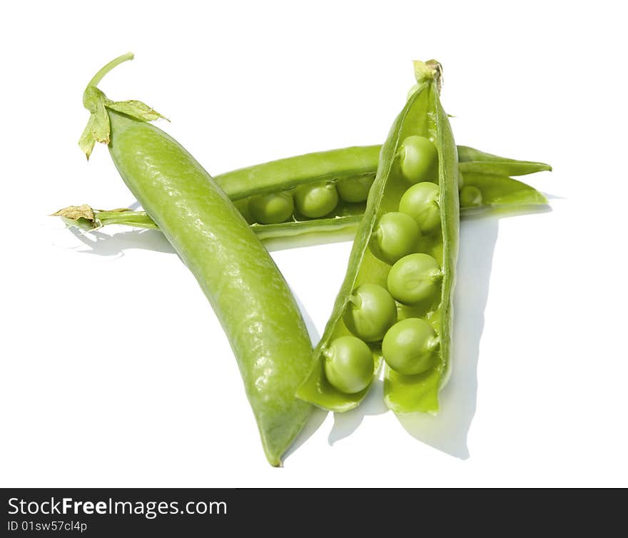 Three open pea pods isolaned on white. Three open pea pods isolaned on white