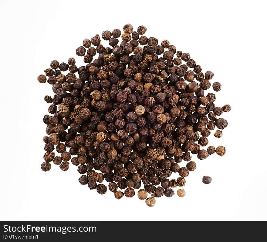 Heap of black peppercorns - studio shot