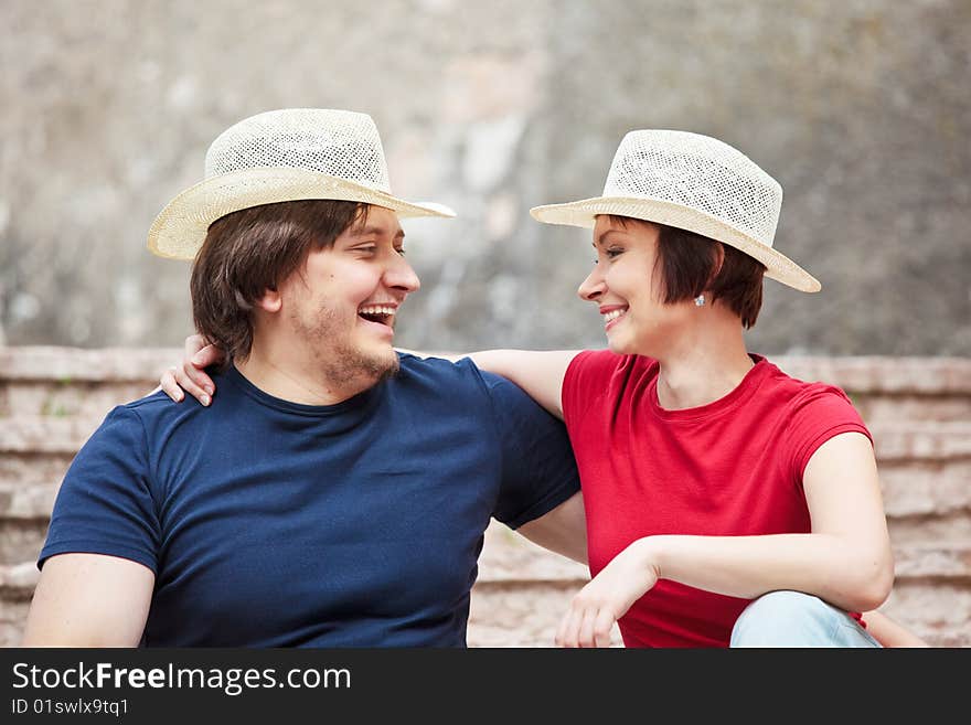 Happy man and woman looking each other. Happy man and woman looking each other