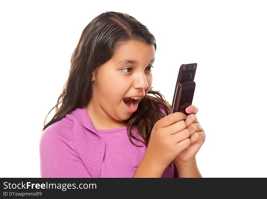 Shocked Pretty Hispanic Girl On Cell Phone Isolated on a White Background.