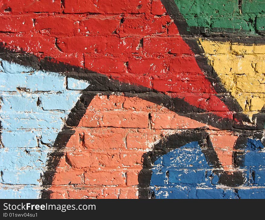 Full colored graffitti on a rustic wall. Full colored graffitti on a rustic wall