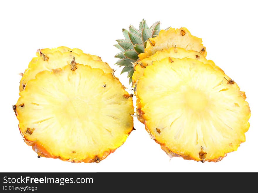 Pineapple segments on a white background, it is isolated.