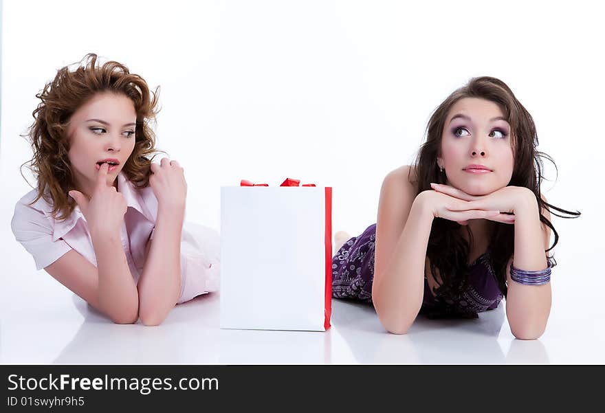 Young Emotional Women With Paper Bag