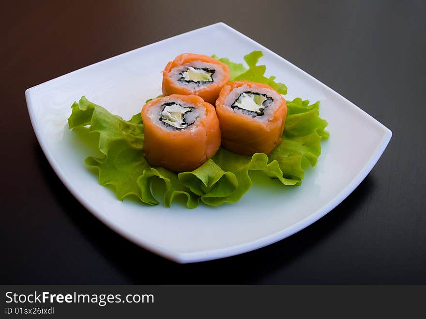 Photo of a rolled and sushi