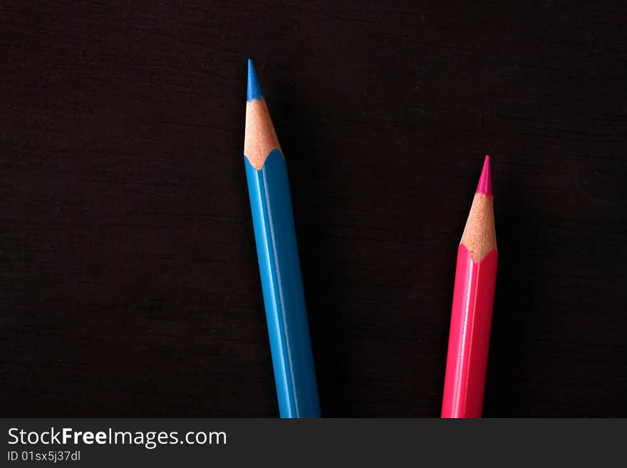 Multicolored pencils with handmade paper