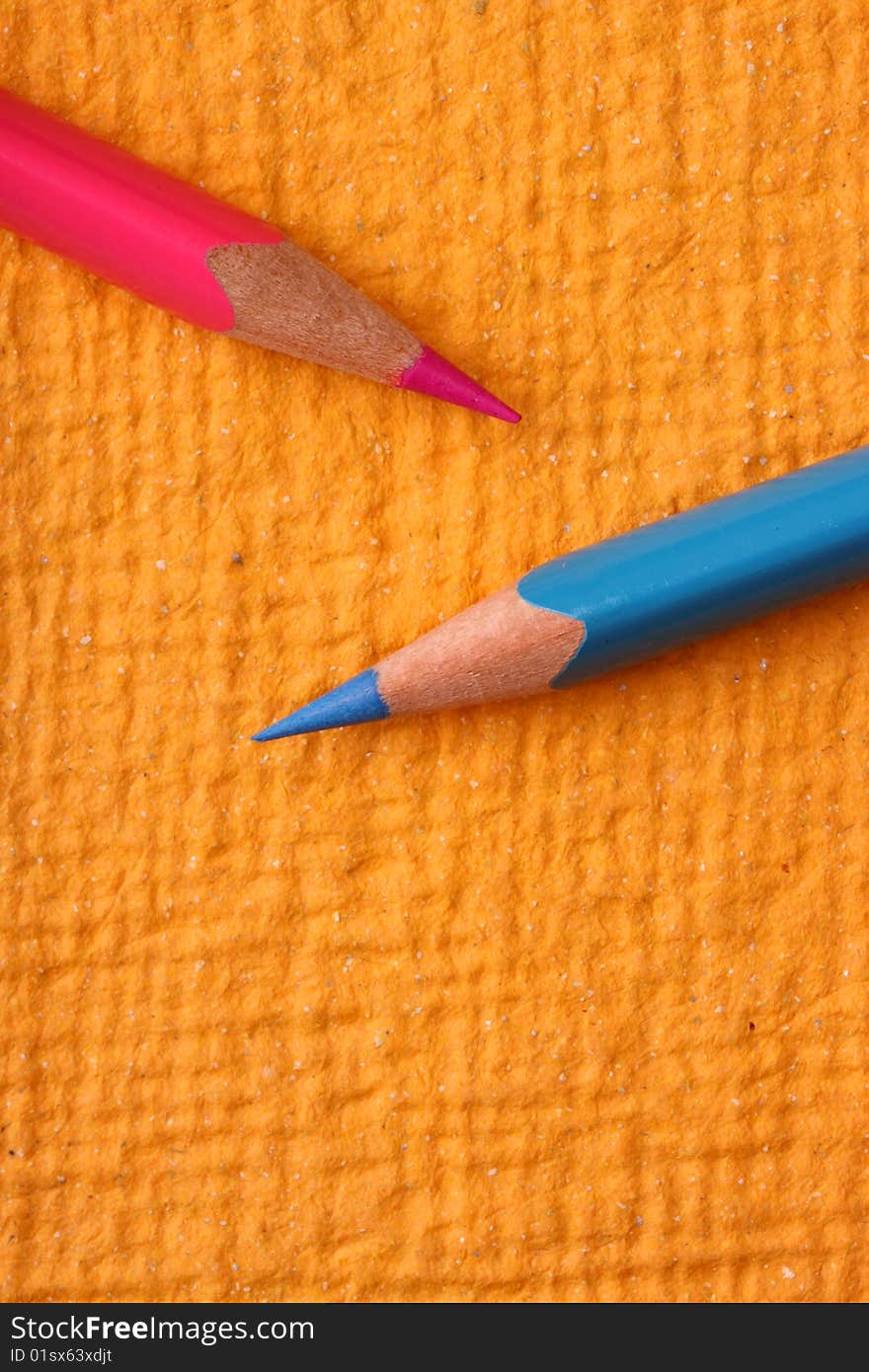 Multicolored pencils with handmade paper