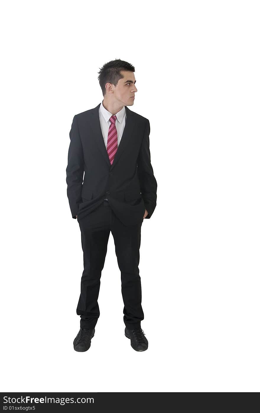 Young man in black suit waiting