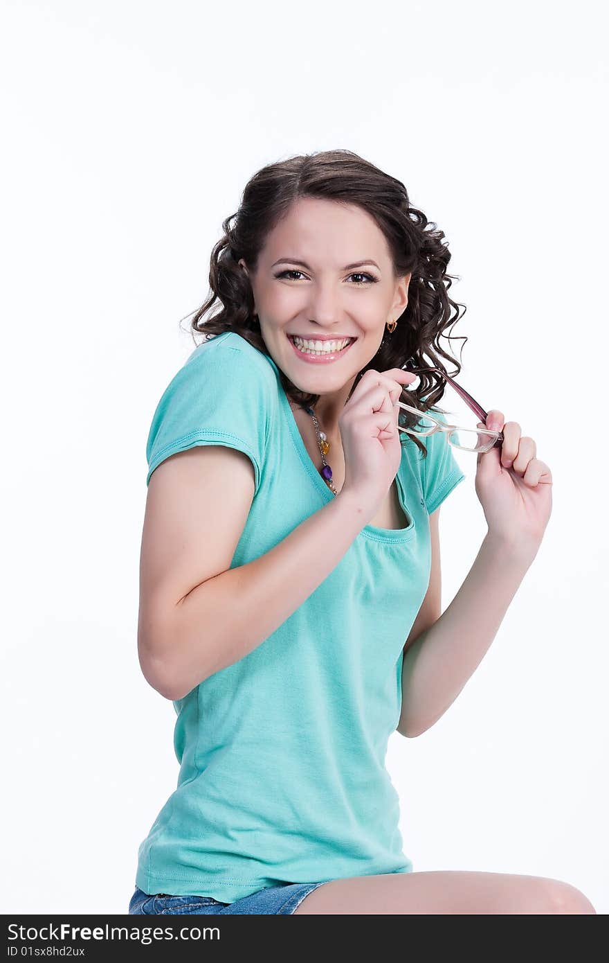 Young woman with glasses on isolated background laughing. Young woman with glasses on isolated background laughing