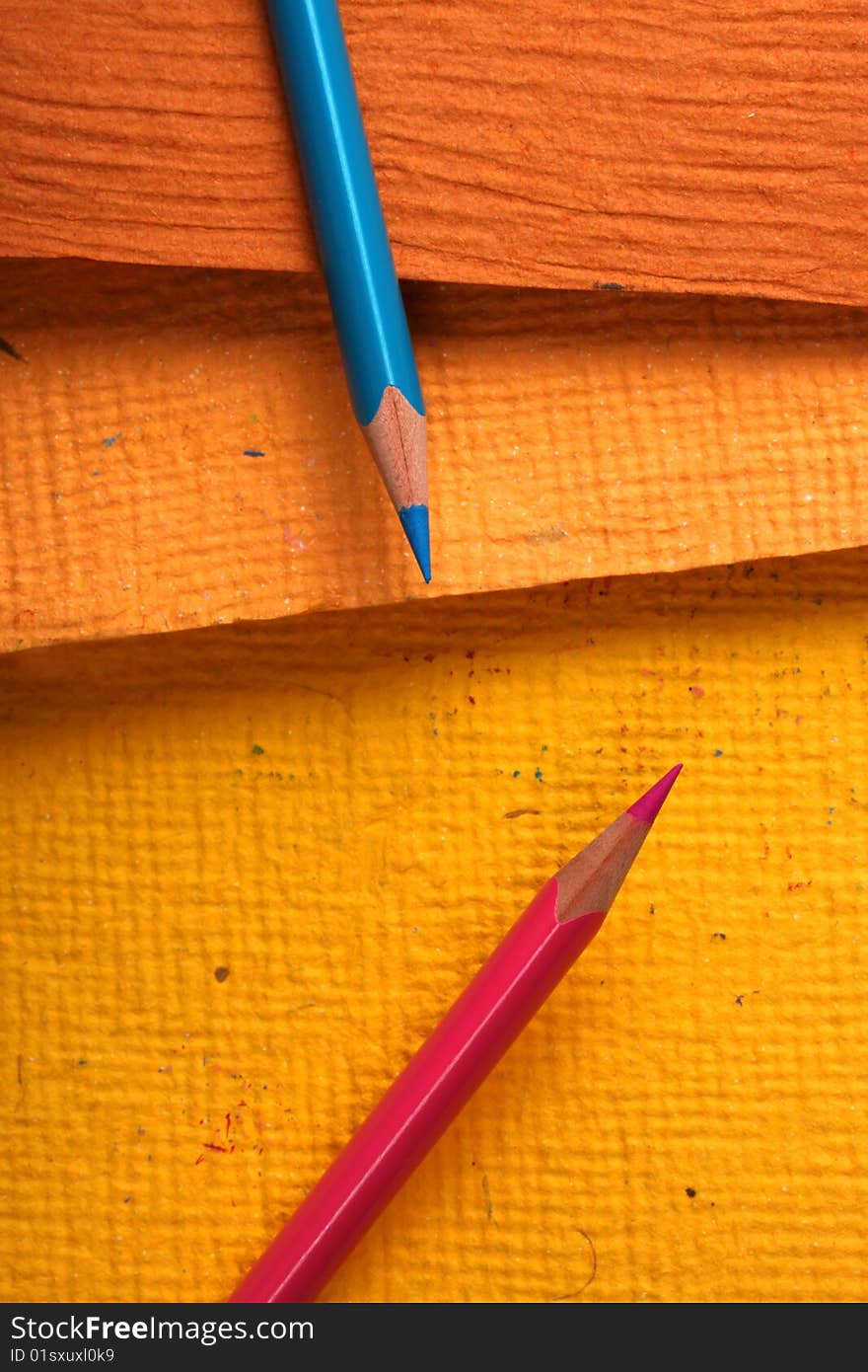 Multicolored pencils with handmade paper