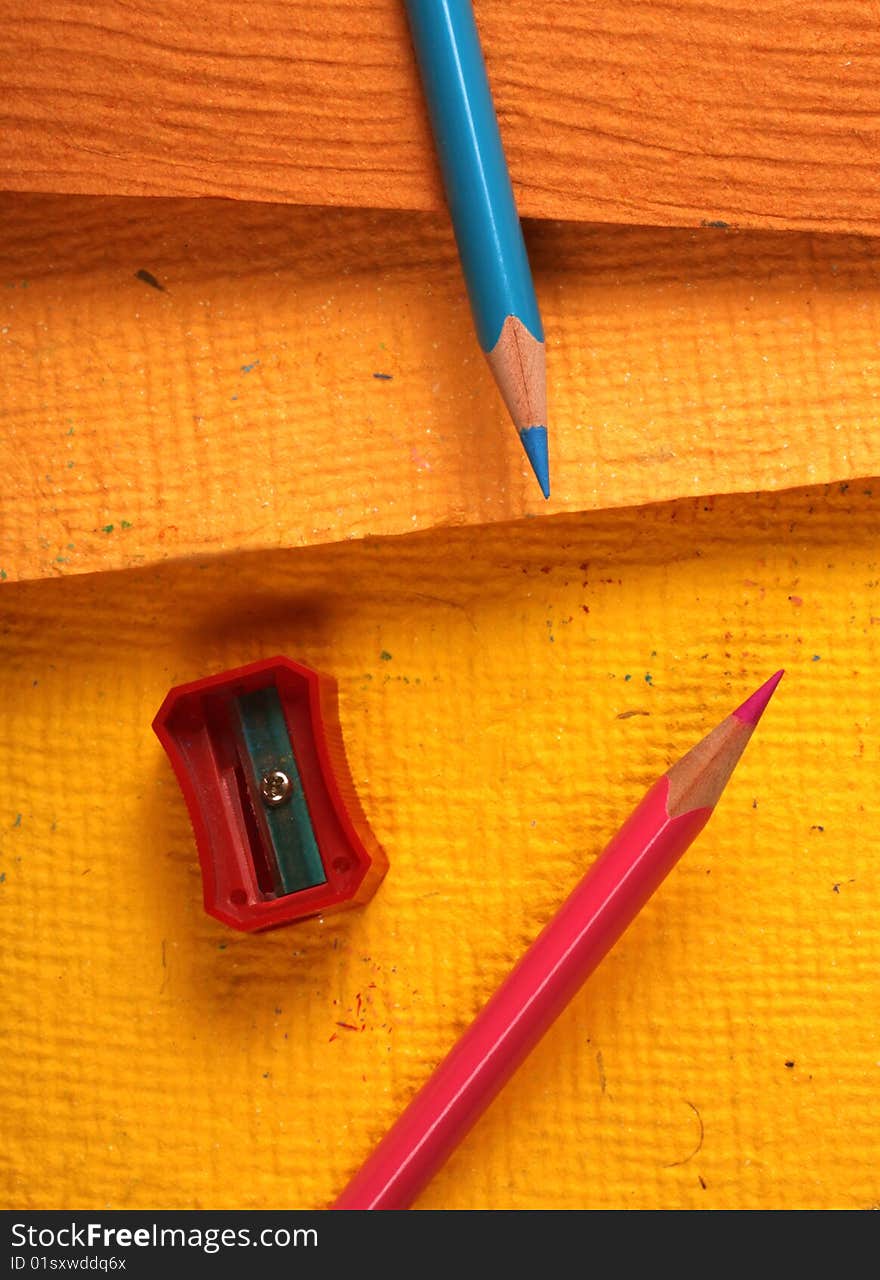 Multicolored pencils with handmade paper