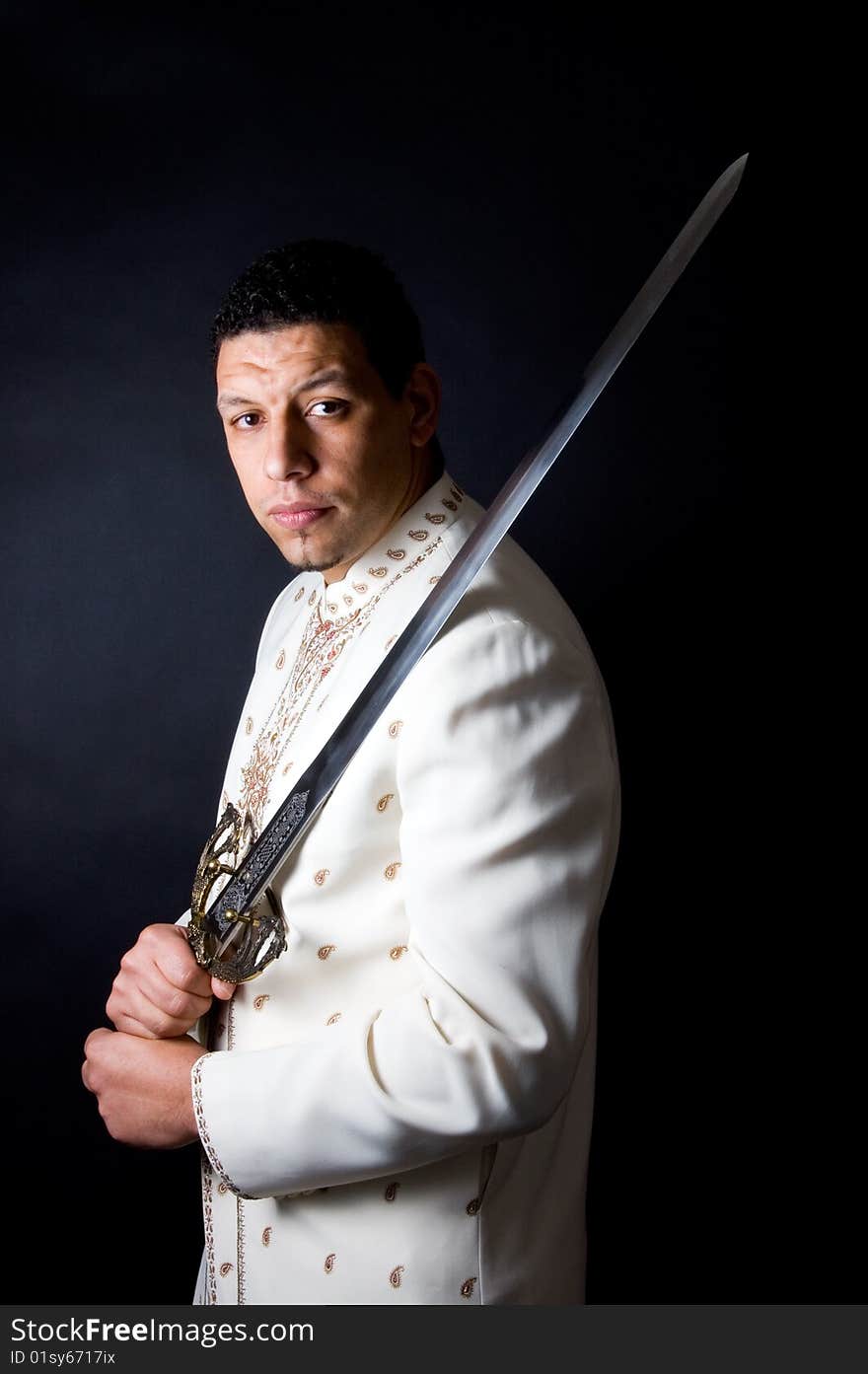 Aruban Algerian Man With Sword On Black Background