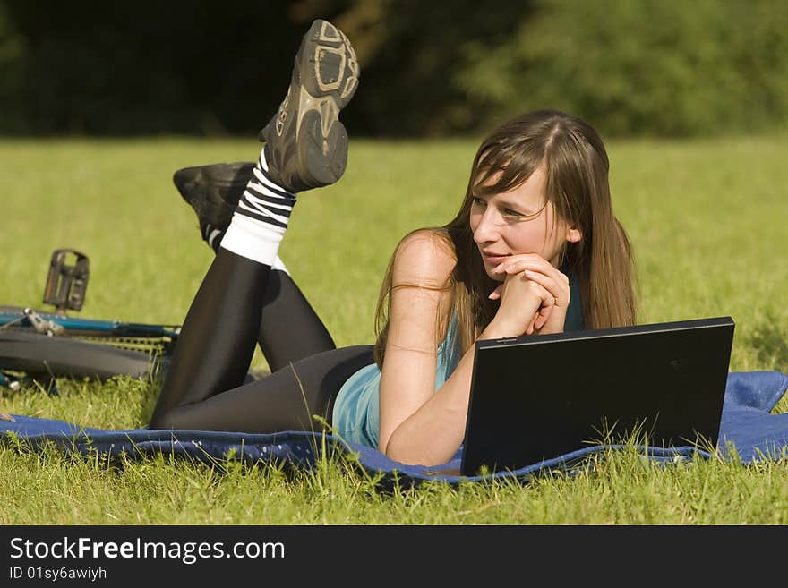 Woman With Laptop Outdoor