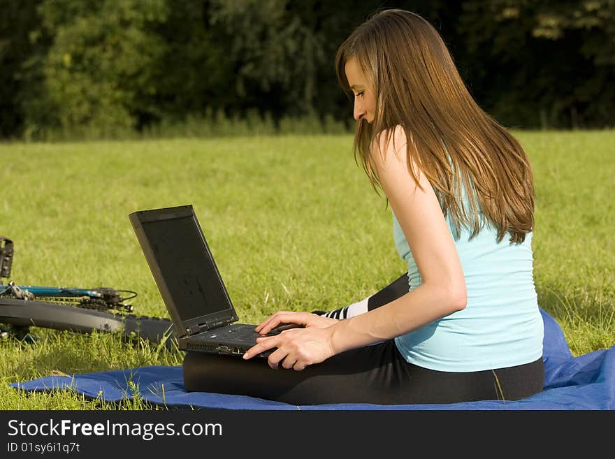 woman with laptop outdoor