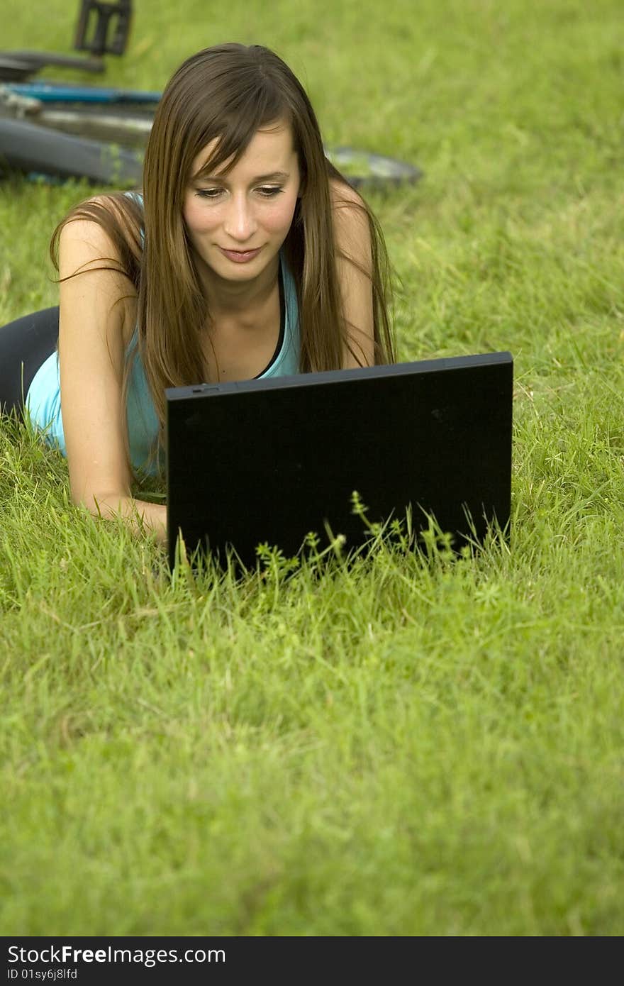 Woman with laptop outdoor