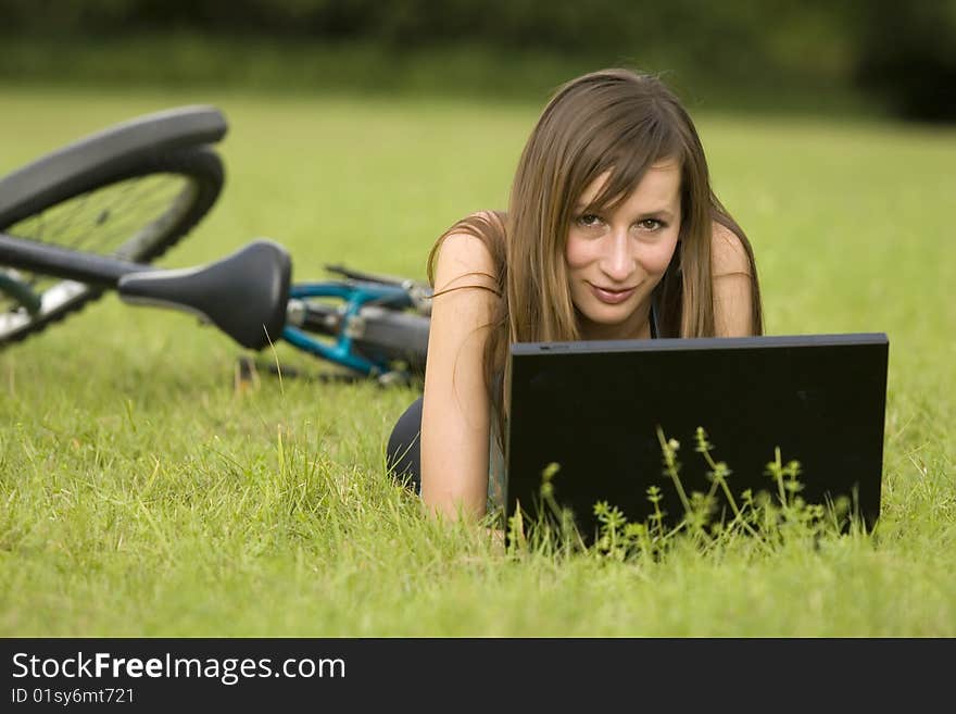 Woman with laptop outdoor