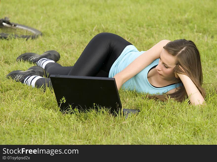 Woman with laptop outdoor