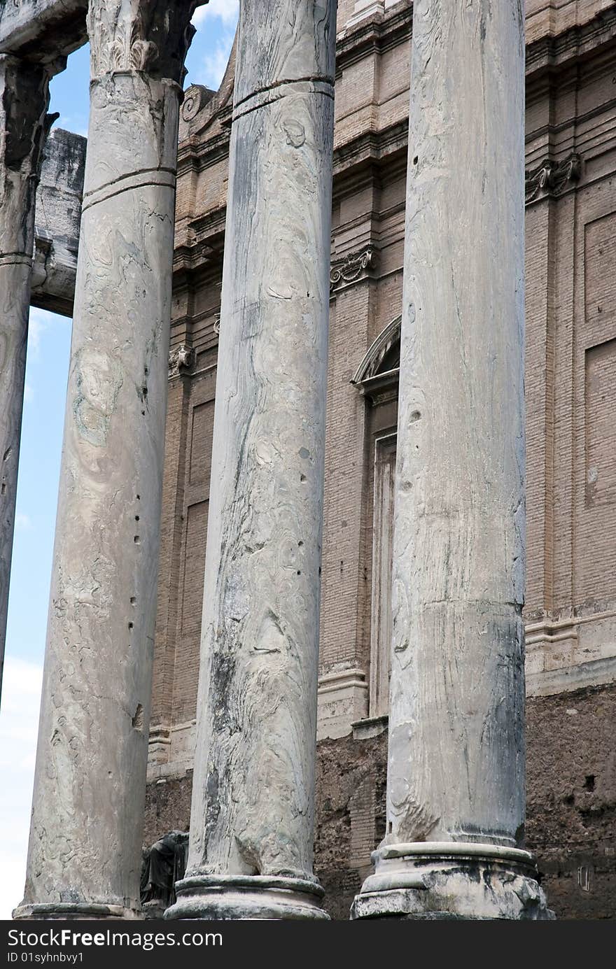 Three white old marble columns