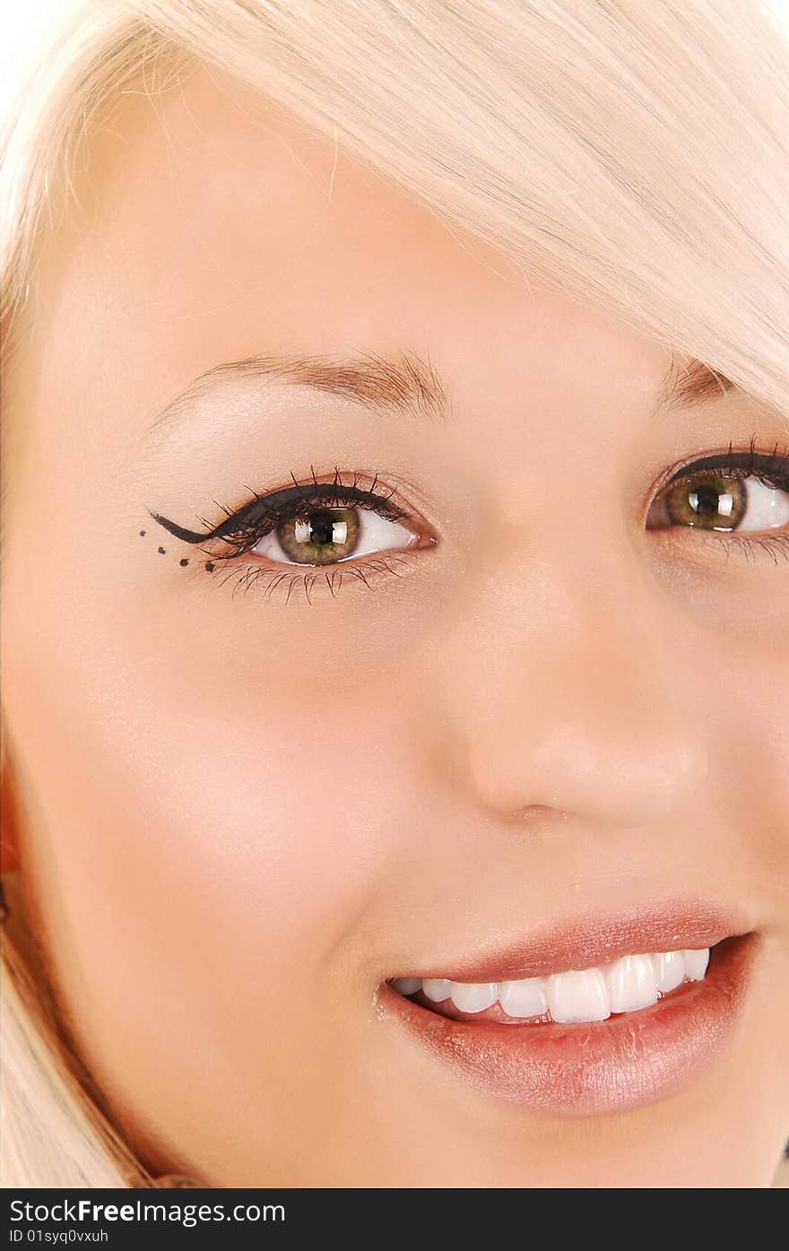 Gorgeous blond woman face with little open mouth and nice make-up on her eyes. Gorgeous blond woman face with little open mouth and nice make-up on her eyes.