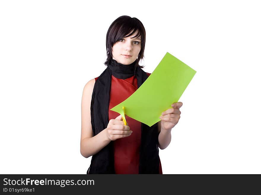 The young beautiful businesswoman at office behind work on a white background. The young beautiful businesswoman at office behind work on a white background