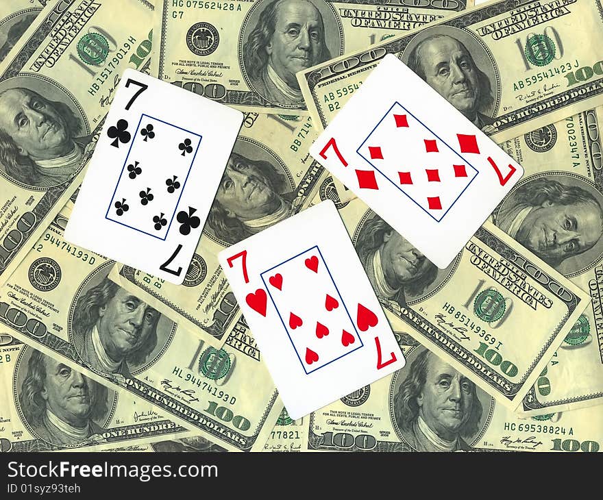 Background of money and playing cards isolated over white. Background of money and playing cards isolated over white