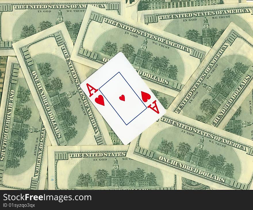 Background of money and playing cards isolated over white. Background of money and playing cards isolated over white