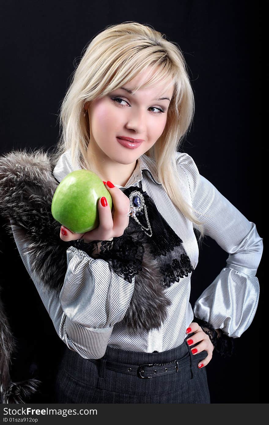 Girl in fur with apple. Girl in fur with apple