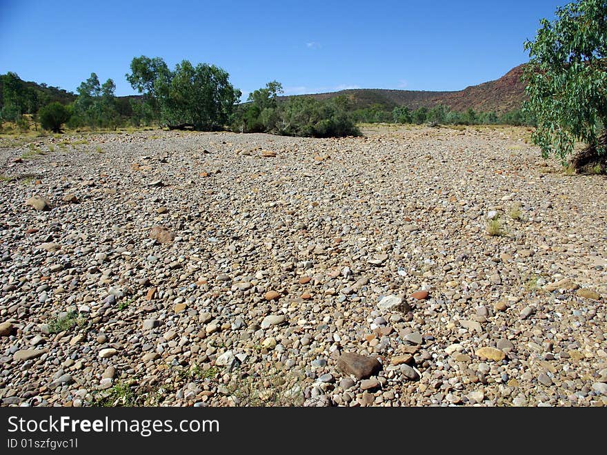 View of the dry bed of the Finke River, Northern Territory - Australia. View of the dry bed of the Finke River, Northern Territory - Australia.