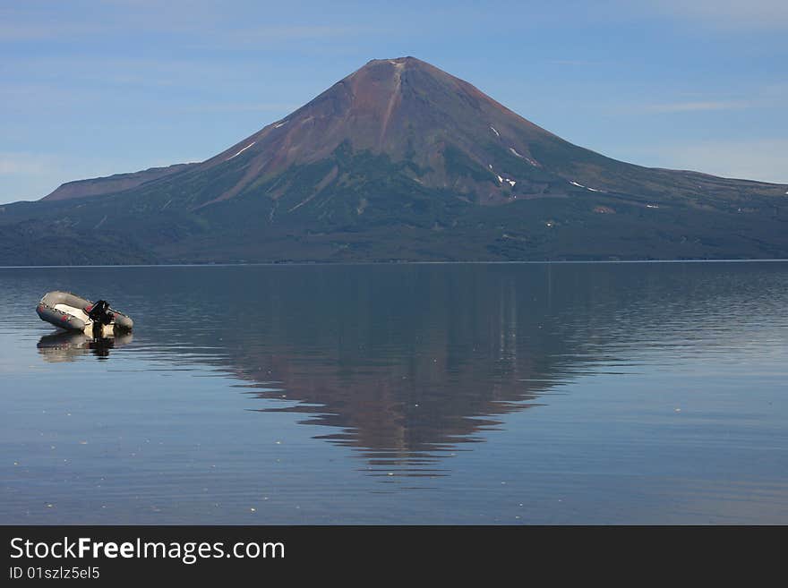 Boat at volcano shadow 1