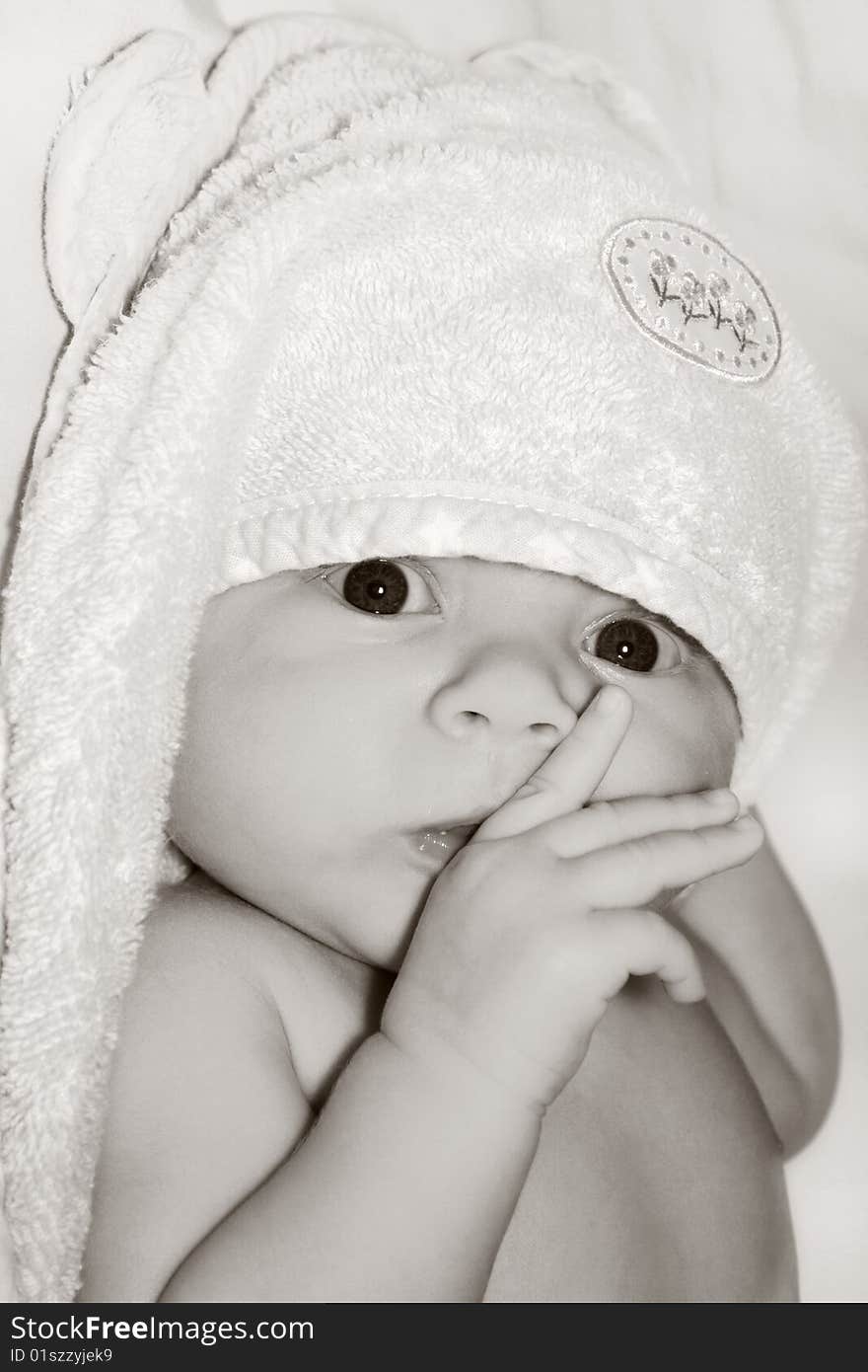 Close-up monochrome toned portrait of cutie baby. Close-up monochrome toned portrait of cutie baby.