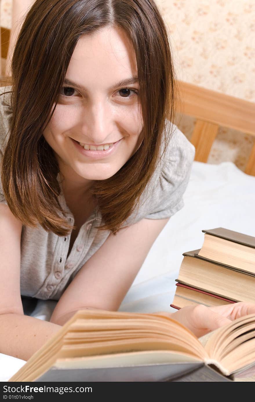 Young smiling student woman with books. Young smiling student woman with books