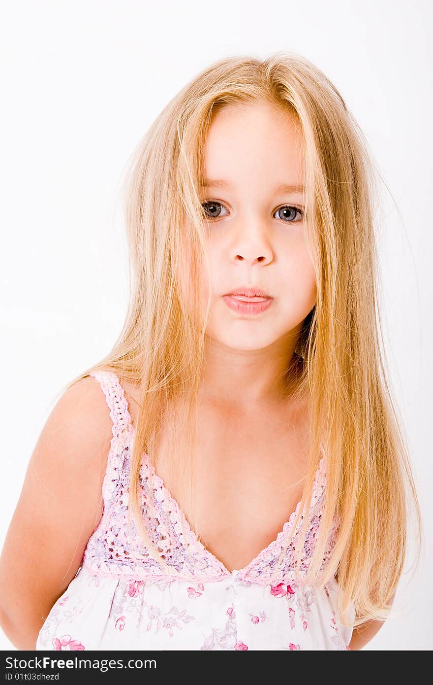 Beautiful little girl with long blonde hair