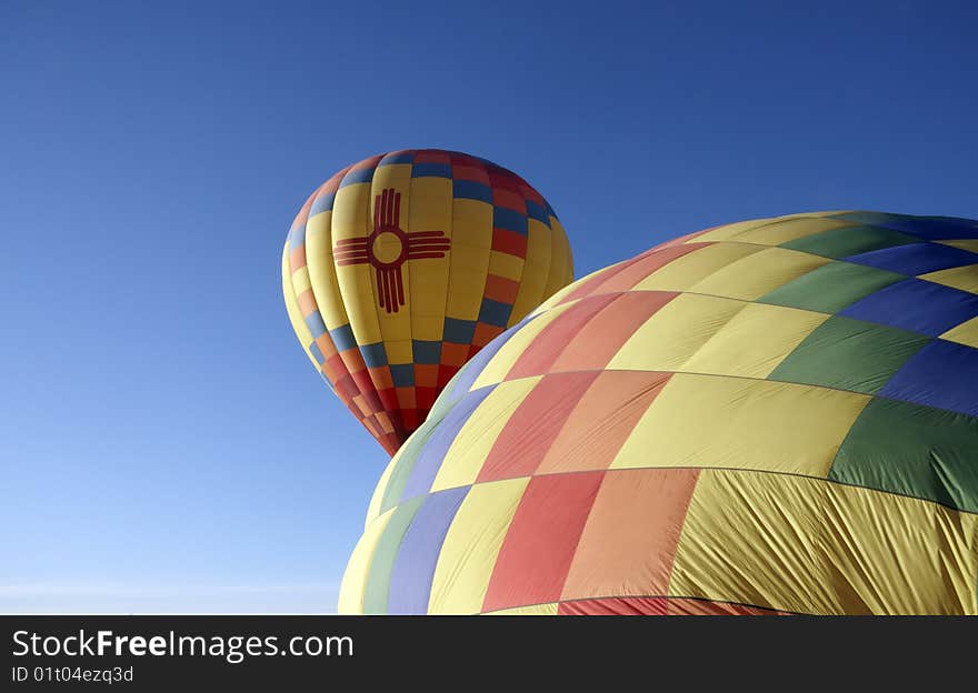 Hot air balloon on the ground and on the air