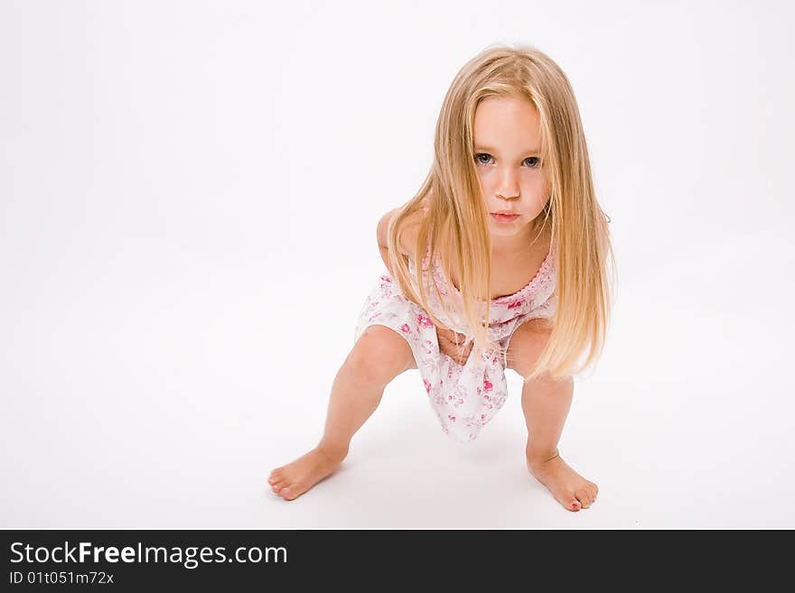 Beautiful little girl with long blonde hair