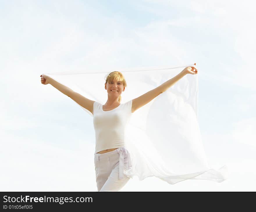 Session of a relaxation on a background of the years sky of the girl in white