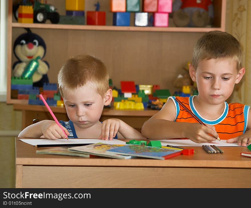 Two boys in a children's room. Two boys in a children's room