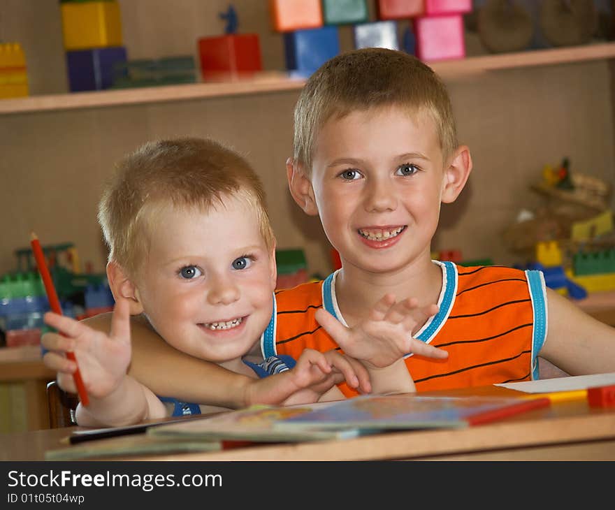 Two boys in a children's room. Two boys in a children's room