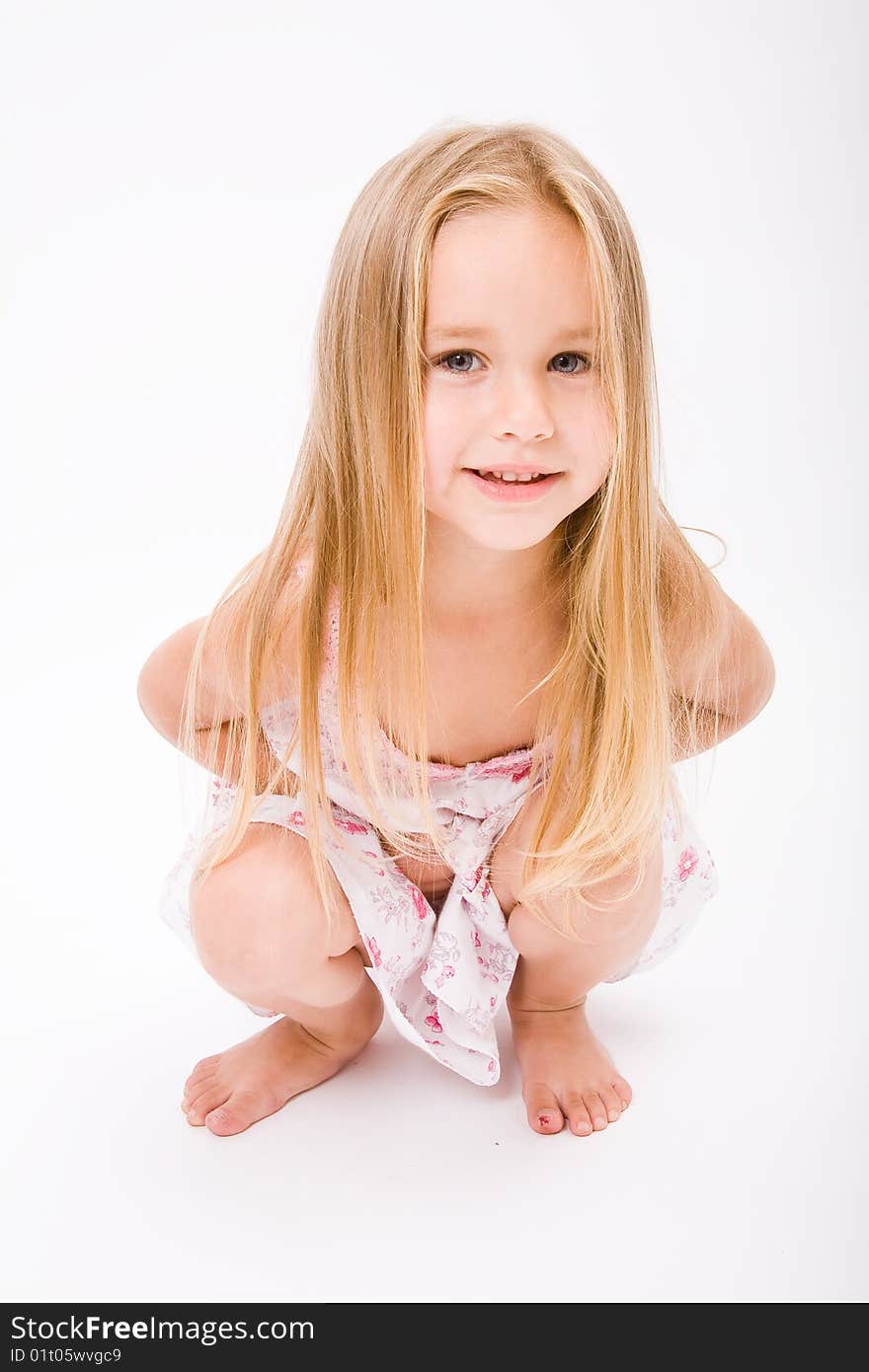 Beautiful little girl with long blonde hair