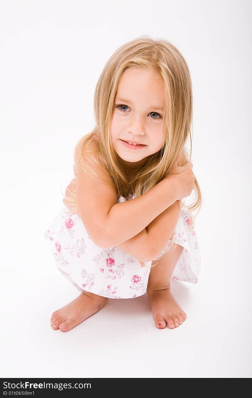 Beautiful little girl with long blonde hair